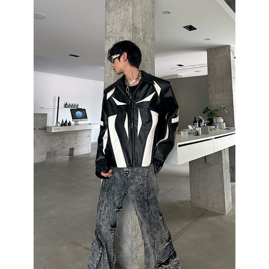 MARTHENAUT NICHE DECONSTRUCTED PANELS, CONTRASTING DESIGNS, PRESSED PLEATED SHOULDERS, PU, LEATHER SILHOUETTE, LEATHER JACKET TOP