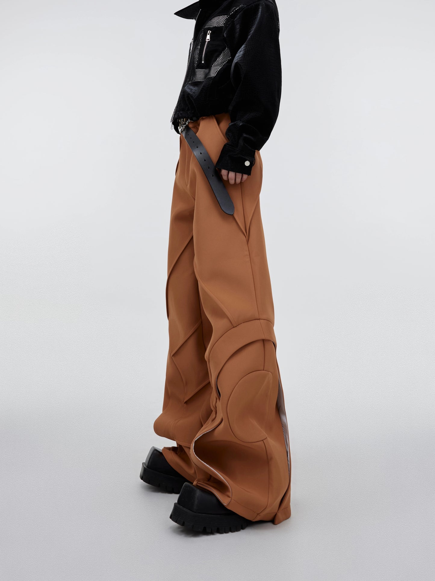 CulturE's niche lines are deconstructed and stitched with draped trousers, solid flared slacks, and double-layered design trousers