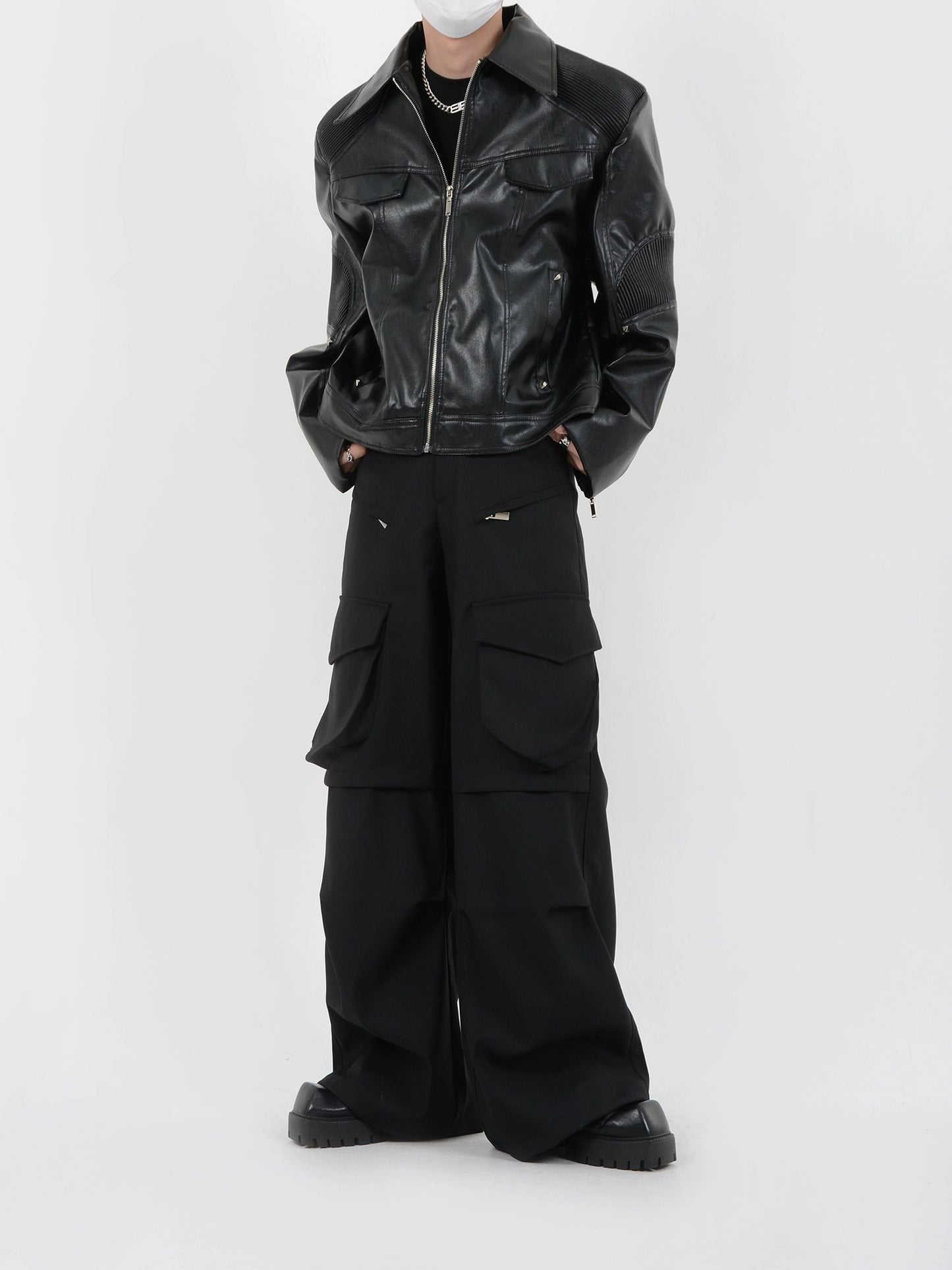 LUCE GARMENT is a niche deconstructed high-end padded shoulder patchwork pu leather jacket design sense short biker suit
