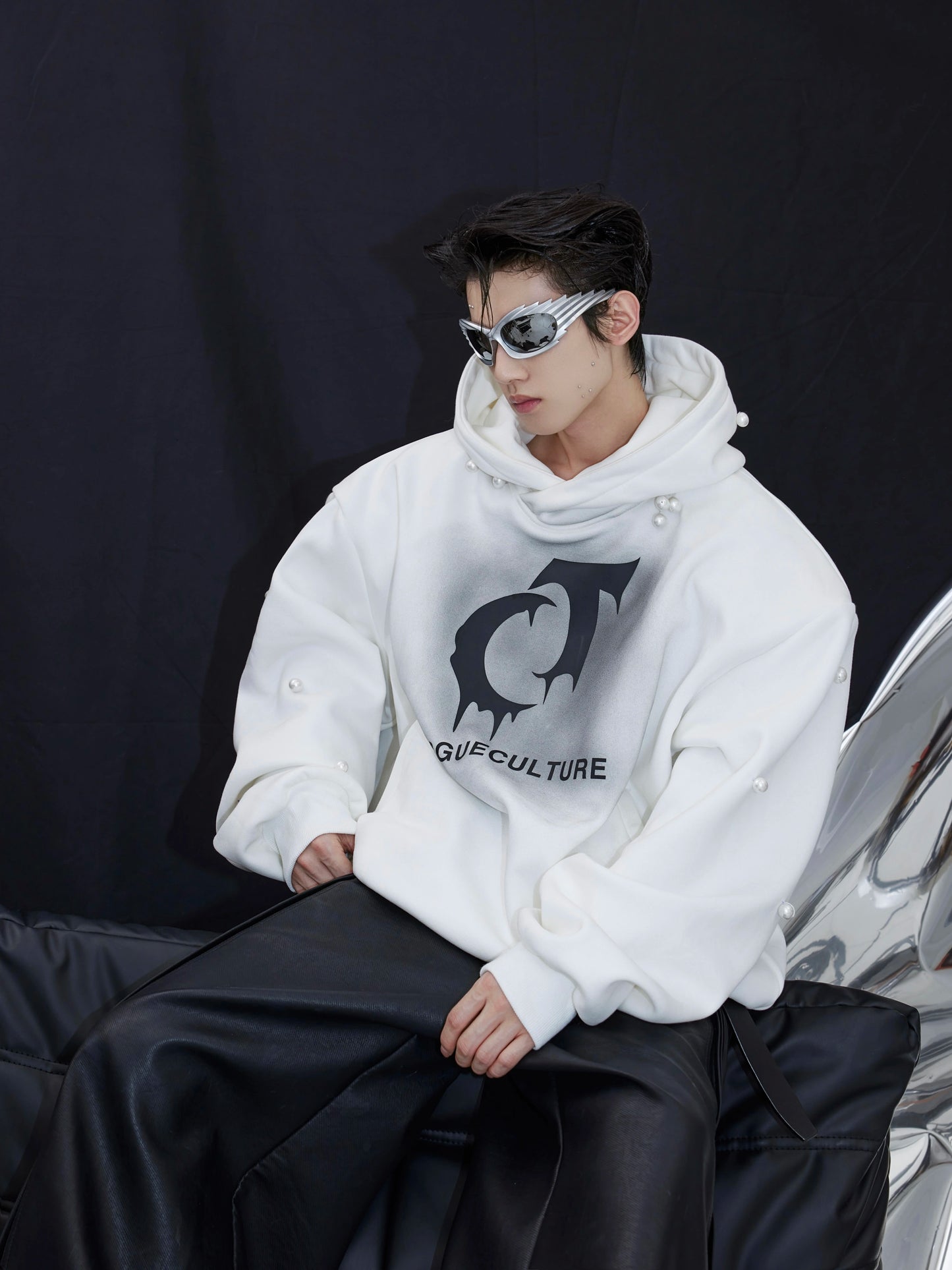 CulturE Fall/Winter Blockbuster pearl-embellished hooded sweatshirt with logo spray painting and fleece silhouette top