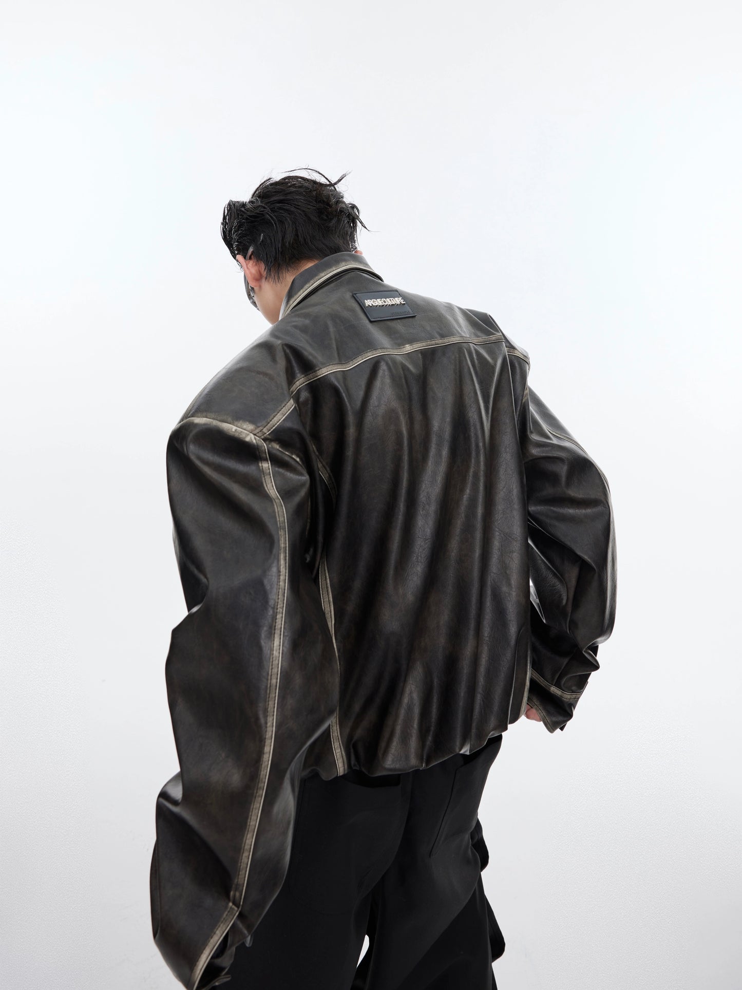 Cultur E24ss, a heavyweight vintage rubbed leather distressed padded-shoulder jacket, a jacket, a niche cropped silhouette, a loose-fitting leather jacket